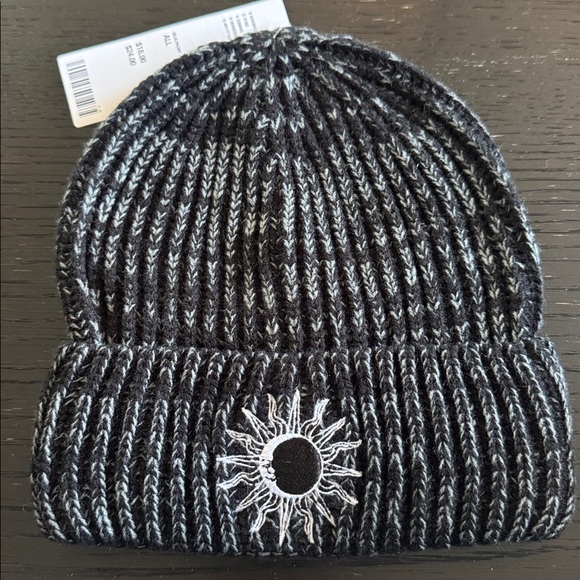 Urban Outfitters Accessories - Urban Outfitters marled black ribbed knit embroidered sun/moon cuffed beanie.